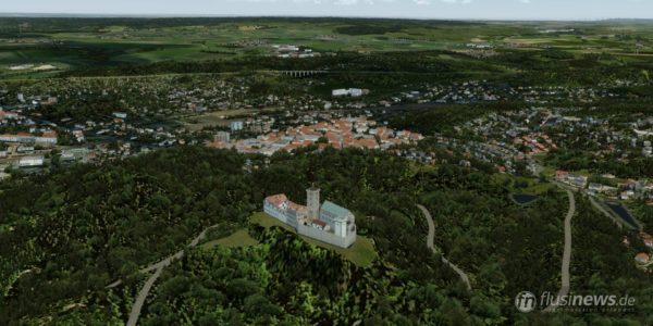 Die Wartburg mit Eisenach im Hintergrund
